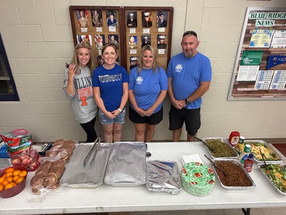Big Moe's team behind the buffet table, ready to serve the Blue Ridge football team